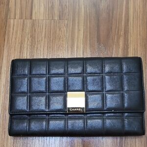 CHANEL Three-Fold Black Quilted Leather Wallet with Gold Logo Plate